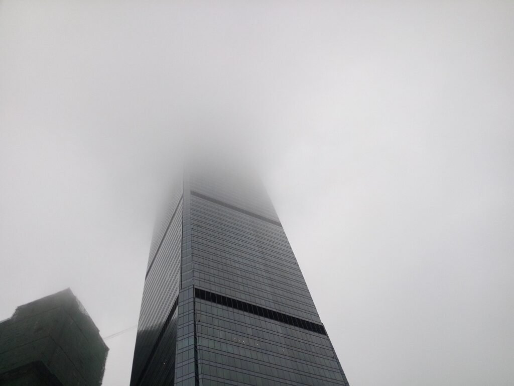 building, tall building, heavy fog